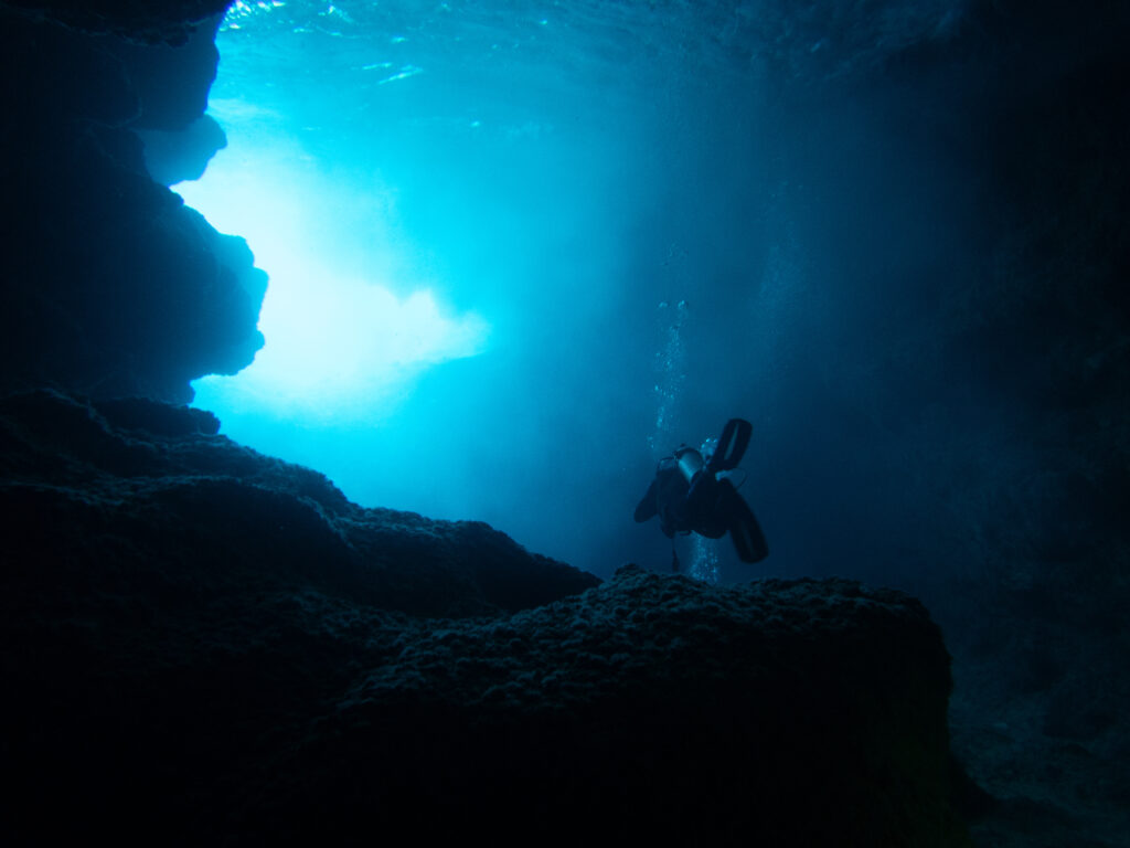 Swimming out of one of the underwater caverns - Niue